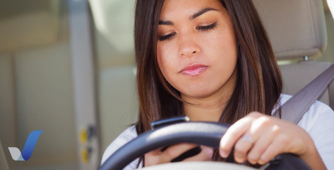 Young Girl Texting While Driving